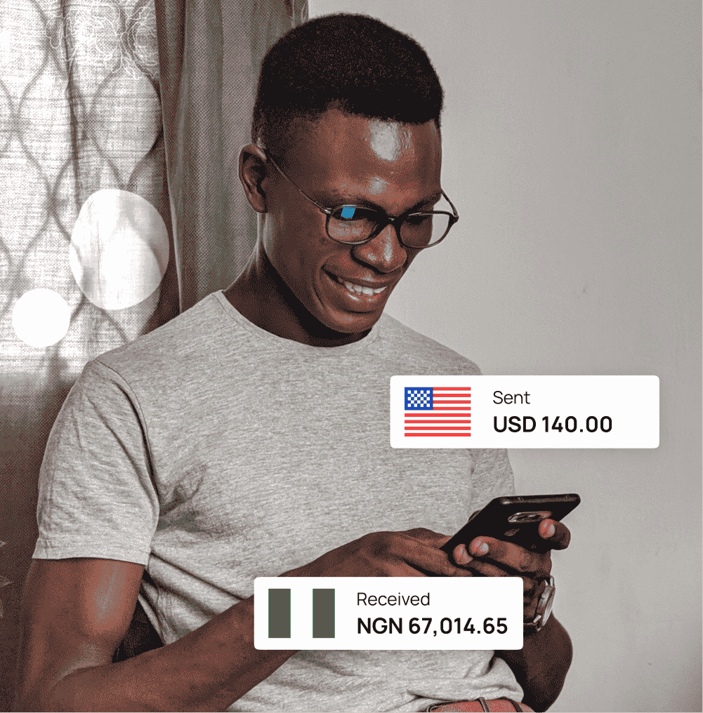 A-man-holding-his-phone-and-sending-money